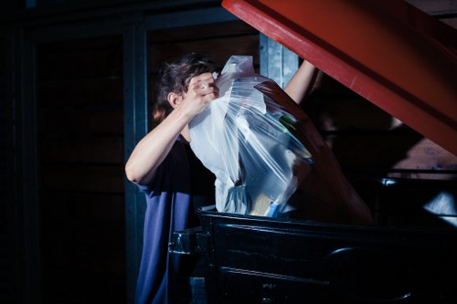 Professional waste removal team handling business junk