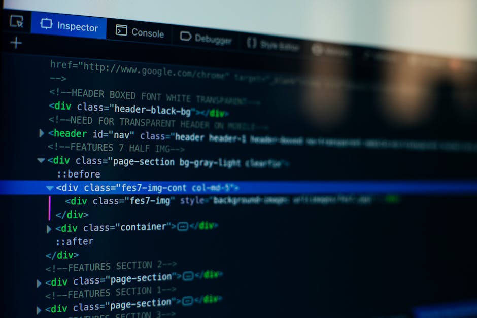 A close-up photograph of a computer screen displaying code with syntax highlighted in various bright colors, including orange, green, pink, and yellow, against a dark background. The code appears to b